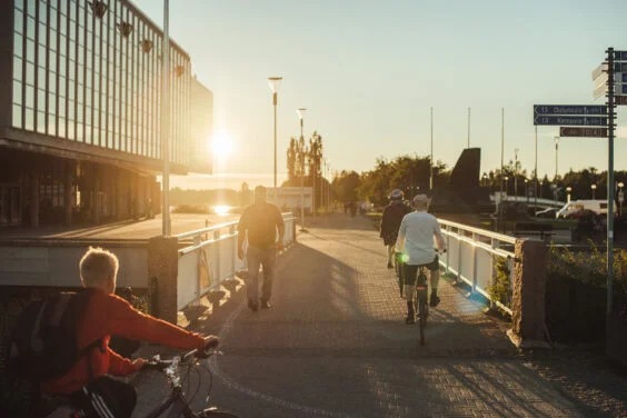 Oulu, Finland - August 17, 2015: Walkway in city centre in Oulu Finland with people passing.