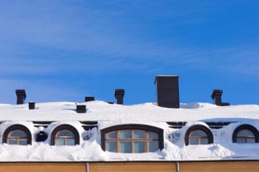 Snow covered roof and dormer windows.To see more of my winter images click the link below: